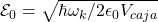 \mathcal{E}_0 = \sqrt{\hbar \omega_k / 2\epsilon_0 V_{caja}}